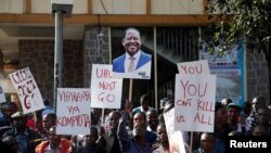 Supporters of Kenyan opposition leader Raila Odinga from the National Super Alliance coalition protest outside the Supreme Court in Nairobi, Kenya, Aug. 18, 2017.