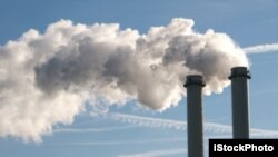 FILE: Smokestacks filling the air. Taken May 17, 2014.