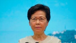 Hong Kong Chief Executive Carrie Lam listens to reporters' questions during a press conference in Hong Kong, Tuesday, July 7, 2020. TikTok says it will stop operations in Hong Kong, joining other social media companies.