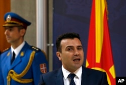 FILE - Macedonian Prime Minister Zoran Zaev speaks during a press conference in Belgrade, Serbia, Nov. 21, 2017.