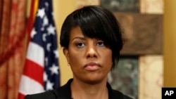 FILE - Mayor Stephanie Rawlings-Blake prepares to speak to the media at City Hall in Baltimore, May 1, 2015.