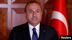 FILE - Turkish Foreign Minister Mevlut Cavusoglu speaks at a news conference in Ankara, Turkey, April 1, 2019.