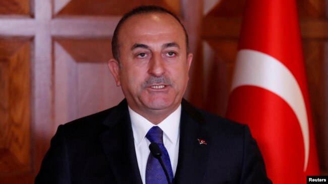 FILE - Turkish Foreign Minister Mevlut Cavusoglu attends a news conference in Ankara, Turkey, April 1, 2019.