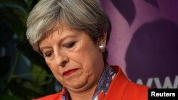 Britain's Prime Minister Theresa May waits for the result of the vote in her constituency at the count center for the general election in Maidenhead, June 9, 2017. 