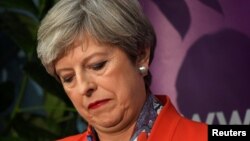 Britain's Prime Minister Theresa May waits for the result of the vote in her constituency at the count center for the general election in Maidenhead, June 9, 2017. 