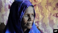 Ibado Mahmud, 50, at the Dagahaley camp in Dadaab, Kenya. Mahmud had her eyes removed by Ethiopian troops before travelling to the camps. Doctors believe she is suffering from post-traumatic stress disorder.