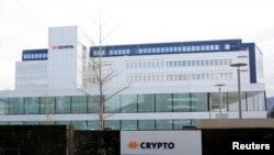 The logo of Crypto AG is seen at its headquarters in Steinhausen, Switzerland, Feb. 11, 2020.