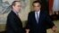 Vietnam's Deputy Prime Minister Nguyen Thien Nhan (L) shakes hands with Chinese Premier Li Keqiang during a meeting at the Zhongnanhai compound in Beijing, May 10, 2013.
