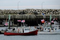 Fishing boats from the Sipekne'katik band, part of the First Nations Mi'kmaw community, who began harvesting lobster outside of the commercial season, are seen tied up in Saulnierville, Nova Scotia, Canada, Sept. 22, 2020.