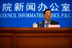 Zeng Yixin, Vice Minister of the Chinese National Health Commission, speaks at a press conference at the Information Office of the State Council in Beijing on Thursday, July 22, 2021. Mark Schiefelbein/AP