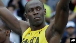 Usain Bolt lors du 100 mètres-messieurs aux Jeux Olympiques d'été de 2016 au stade olympique à Rio de Janeiro, au Brésil, 13 août 2016. 