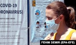 A woman arrives at the hospital to test for coronavirus in Sarajevo, Bosnia and Herzegovina, 01 July 2020.