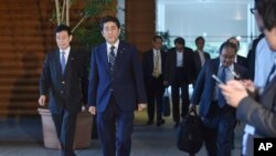 Perdana Menteri Jepang Shinzo Abe memberi keterangan kepada meda di Tokyo, sebelum berangkat ke Amerika Serikat, Rabu, 6 Juni 2018.