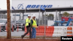 Workers walk through the Boeing South Carolina Plant while voting started on Wednesday whether the plant will be unionized in North Charleston, South Carolina, Feb. 15, 2017. 