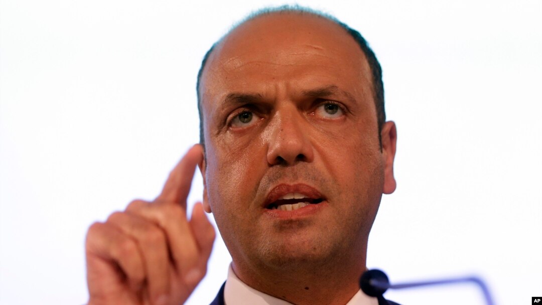 FILE - Italian Interior Minister Angelino Alfano speaks at a press conference during an informal meeting on Justice and Home Affairs in Milan, Italy, July 2014.