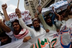 Supporters of Jamaat-ud-Dawa chant slogans during a protest in Karachi, Pakistan, June 27, 2014. The U.S. State Department has named Jamaat-ud-Dawa a "foreign terrorist organization," a status that freezes assets it has under U.S. jurisdiction.
