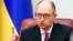 Ukraine's Prime Minister Arseny Yatseniuk speaks during a government meeting in Kyiv, Dec. 3, 2014. 