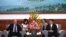 美国前财政部部长保尔森与中国国家主席习近平（资料照片）