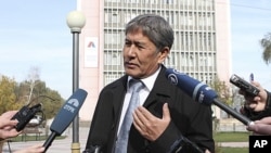 Prime Minister and presidential candidate Almazbek Atambayev talks to journalists in the capital Bishkek, October 31, 2011.