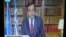 In this image taken from NET state television channel Greece's Prime Minister Antonis Samaras makes an announcement to the Greek people from his office in Athens, April 15, 2013.