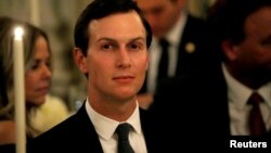 FILE - White House senior adviser Jared Kushner listens as U.S. President Donald Trump speaks at a dinner to honor evangelical leadership in the State Dining Room at the White House in Washington, Aug. 27, 2018. 