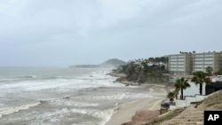 Hotels stand along the shore before the arrival of Tropical Storm Ileana in San Jose de los Cabos, Mexico, Sept. 13, 2024. 