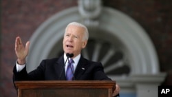 FILE - Former vice president Joe Biden speaks at Harvard University in Cambridge, Massachusetts, May 24, 2017. Declaring “this is a time for big dreams,” Biden on June 1, 2017, launched a political action committee that’s stoking fresh speculation he may seek the presidency in 2020.