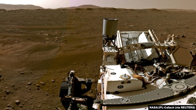 A portion of a panorama made up of individual images taken by the Navigation Cameras, or Navcams, aboard NASA's Perseverance Mars rover shows the Martian landscape, Feb. 20, 2021. (NASA/JPL-Caltech/Handout via Reuters)