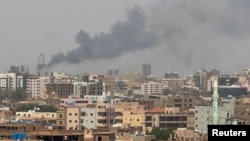 Plumes of smoke rise during fighting between the paramilitary Rapid Support Forces and the army in Khartoum, Sudan, Sept. 26, 2024.