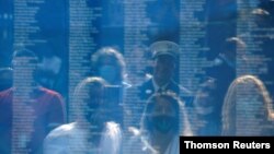 People view names of victims at ceremonies held to mark 19th anniversary of September 11, 2001 attacks on World Trade Center in New York. (Reuters)