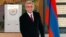 Armenian President Serge Sarkisian casts his ballot during presidential election in Yerevan, Armenia, Feb. 18, 2013.