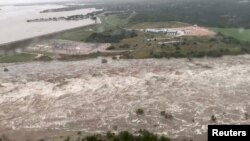 An aerial view shows flooding along Lake Lyndon B. Johnson dam in Llano county, Texas, U.S., Oct. 16, 2018, in this still image from video obtained from social media.