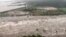 An aerial view shows flooding along Lake Lyndon B. Johnson dam in Llano county, Texas, U.S., Oct. 16, 2018, in this still image from video obtained from social media.
