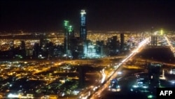 The skyline of Riyadh, Saudi Arabia, March 28, 2014, is seen at night in this aerial photograph from a helicopter.