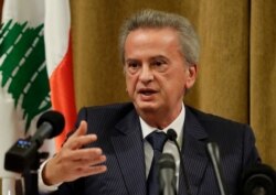 FILE - Lebanon's Central Bank Governor Riad Salameh gestures as he speaks at the bank's headquarters in Beirut, Nov. 11, 2019.