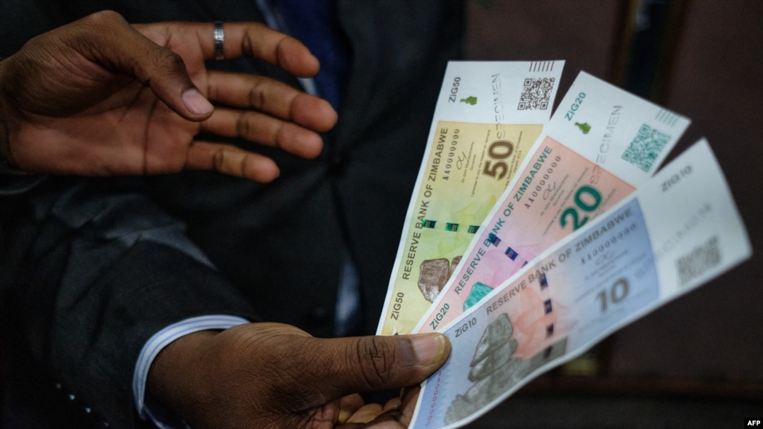 Zimbabwe Reserve Bank Governer John Mushayavanhu presents his monetary policy statement during which he announced the launch by the central bank of the ZiG (Zimbabwe Gold) a "structured currency" in Harare, April 5 2024 as the new money is an attempt to t