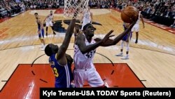  Pascal Siakam, à droite, contre le grand défenseur des Golden State Warriors Draymond Green, finale NBA 2019, Toronto, Canada, le 30 mai 2019. (Kyle Terada-USA TODAY Sports)