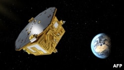 This image from the European Space Agency on Nov. 29, 2015, shows an artist’s rendering of the LISA Pathfinder, designed to test technology for future gravitational-wave observatories in space.