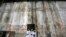 Nigerian pilgrims wait inside the Church of the Nativity, the site revered as the birthplace of Jesus, during Christmas celebrations in the West Bank town of Bethlehem.