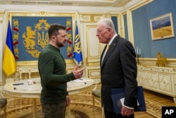 Keith Kellogg, U.S. special envoy for Ukraine and Russia, right, talks with Ukraine's President Volodymyr Zelenskyy in Kyiv, Ukraine, Feb. 20, 2025.