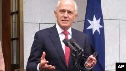 Australian Prime Minister Malcolm Turnbull addresses reporters at Parliament House in Canberra, Aug. 21, 2018. 