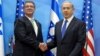 U.S. Defense Secretary Ash Carter (L) shakes hands with Israeli Prime Minister Benjamin Netanyahu upon his arrival at the prime minister's office in Jerusalem, July 21, 2015. 