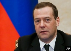 FILE - Russian Prime Minister Dmitry Medvedev speaks during a cabinet meeting in Moscow, March 2, 2017.
