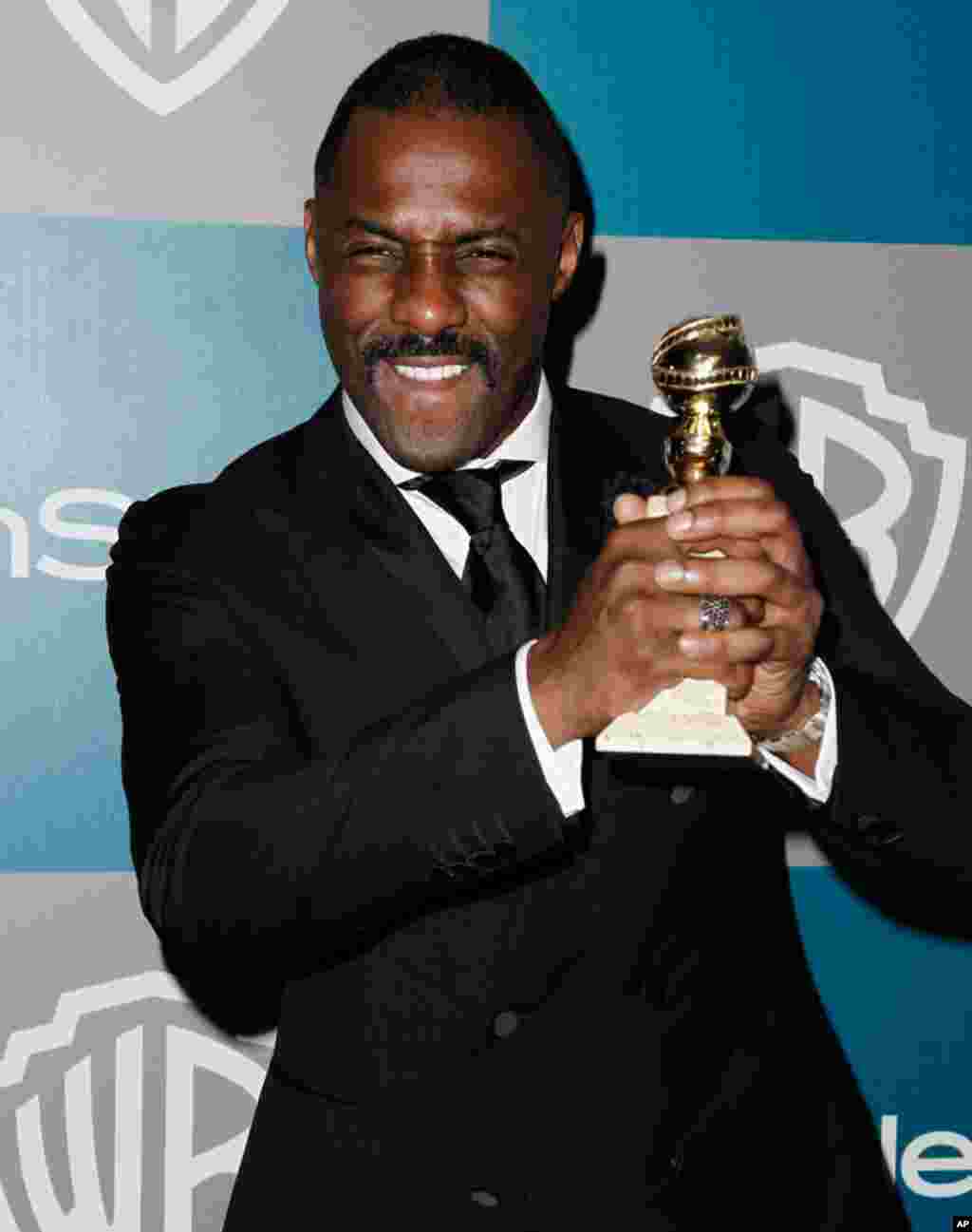 Idris Elba arrives at the 2012 Warner Bros. and InStyle Golden Globe After Party at the Beverly Hilton in Los Angeles. on January 15, 2012. He won Best Performance by an Actor in a Mini-Series or Motion Picture Made for Television for "Luther." (AP)