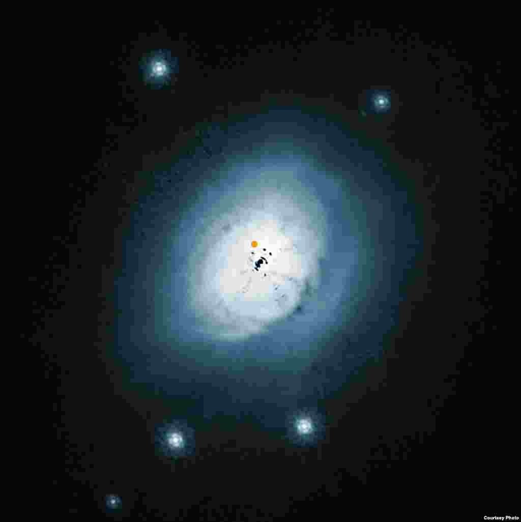 Imagem do telescópio Hubble mostra uma luz visível na parte exterior da poeira ao redor da jovem estrela HD100546.