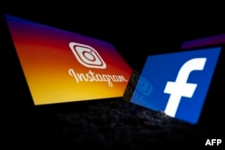 Jejaring sosial AS Facebook dan Instagram di layar tablet dan ponsel pintar di Toulouse, barat daya Prancis. (Foto: AFP)