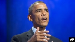 President Barack Obama speaks at the Clinton Global Initiative in New York, Sept. 23, 2014. 