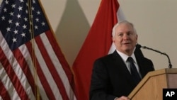 U.S. Secretary of Defense Robert Gates speaks to workers at the US Embassy in the Green Zone in Baghdad, Iraq, 10 Dec 2009