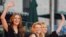 FILE - Emily Robison, Natalie Maines and Martie Maguire, members of The Dixie Chicks, wave to the crowd as they perform on ABC's "Good Morning America" concert series in Bryant Park, in New York, May 26, 2006. The band has changed its name to The Chicks.