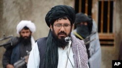 Mullah Mohammed Rasool, the newly-elected leader of a breakaway faction of the Taliban, speaks during a gathering in Farah province, Afghanistan, Nov. 3, 2015. A spokesman on Nov. 14 denied reports that his deputy has been killed.